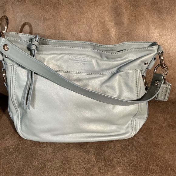 Coach Handbags - Coach full leather pearlized pale blue shoulder bag